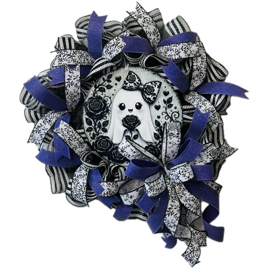 A deco mesh and ribbon wreath featuring a cute ghost with roses metal wreath sign black and white deco mesh and ribbon with purple ribbon by Monkey's Creations. 