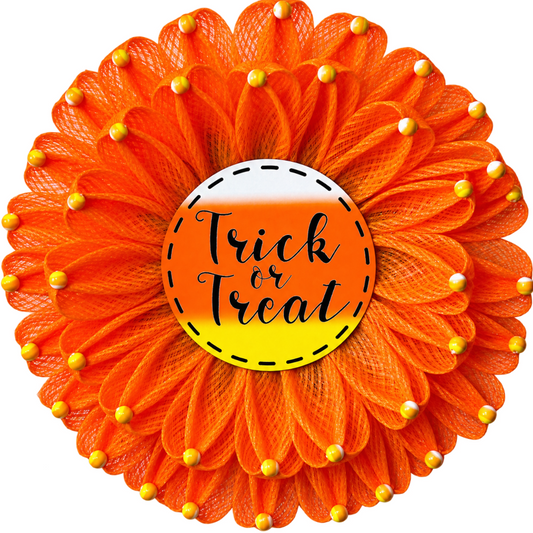 Halloween and candy corn inspired orange, yellow and white deco mesh flower wreath with a trick or treat metal wreath center and wood beaded flower accents by Monkey's Creations. 