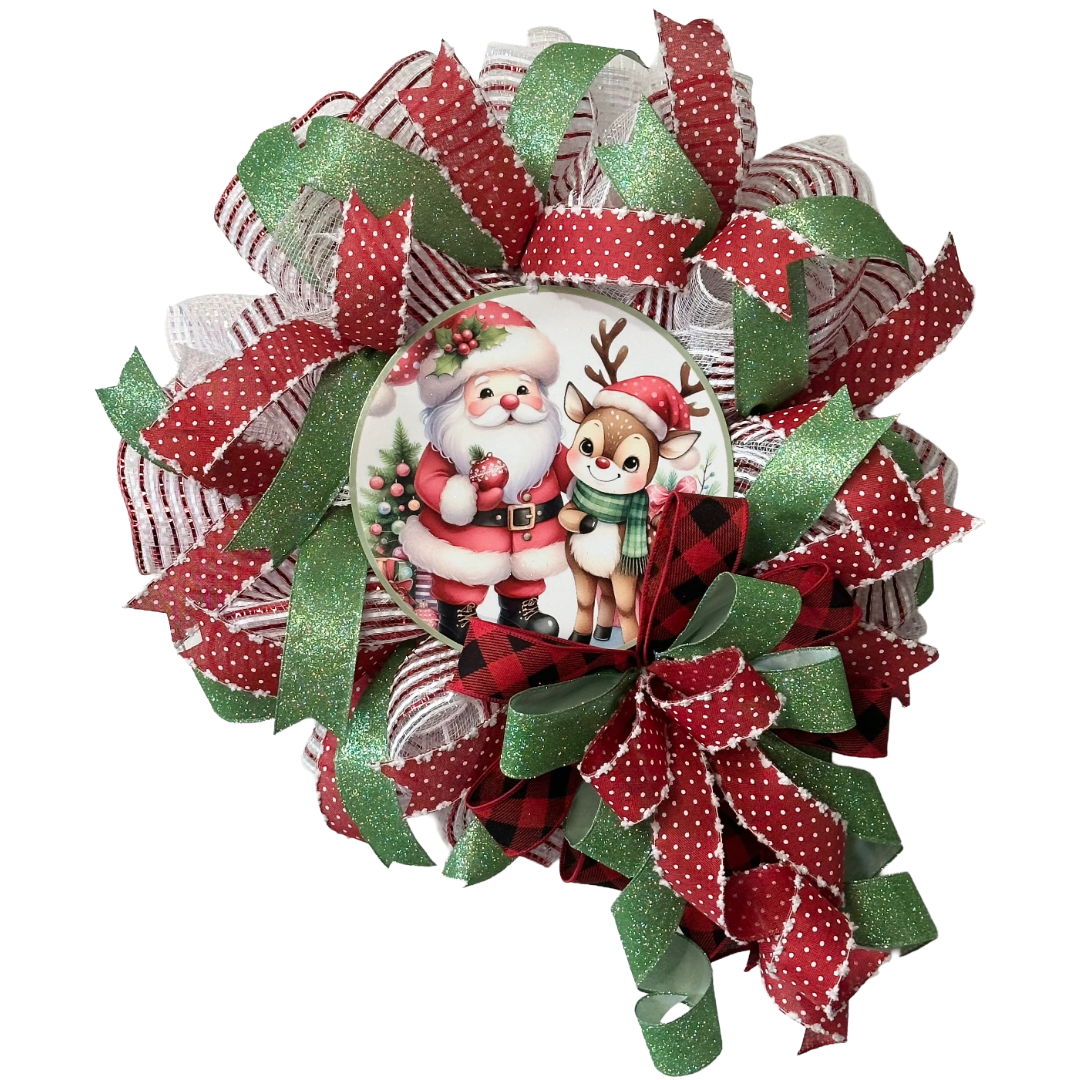 Deco mesh and wired ribbon wreath featuring red and green Christmas colors and a classic Santa and "Rudolph" inspired metal wreath sign center by Monkey's Creations. 