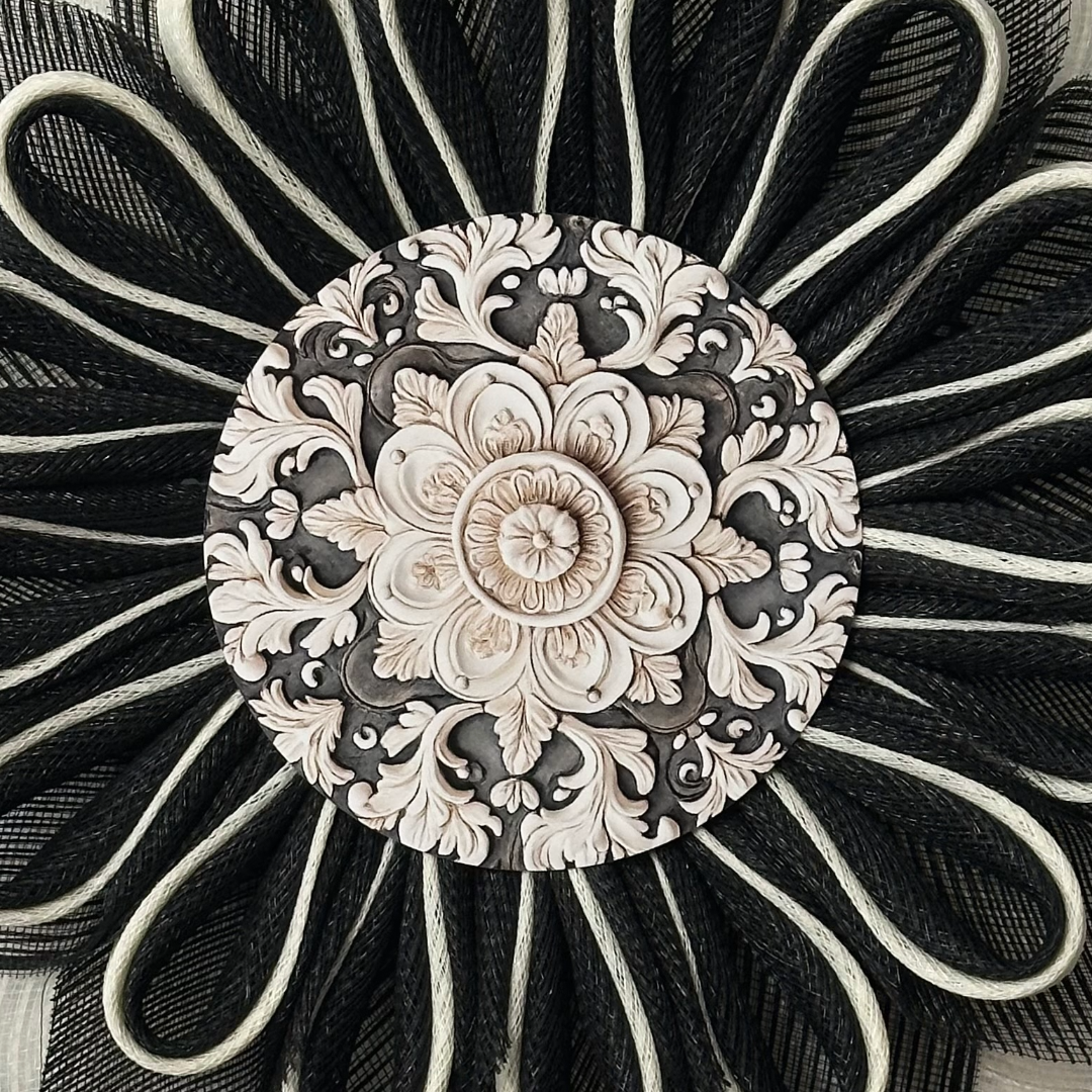 Deco mesh flower wreath with black and creme petals and a charcoal and creme ornate center by Monkey's Creations