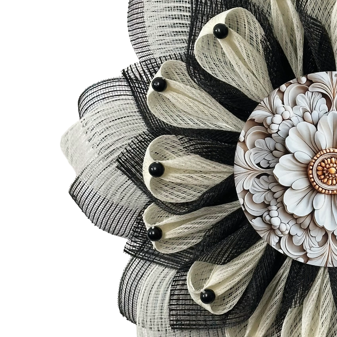Deco mesh flower wreath with black and creme petals and a white and gold ornate center by Monkey's Creations