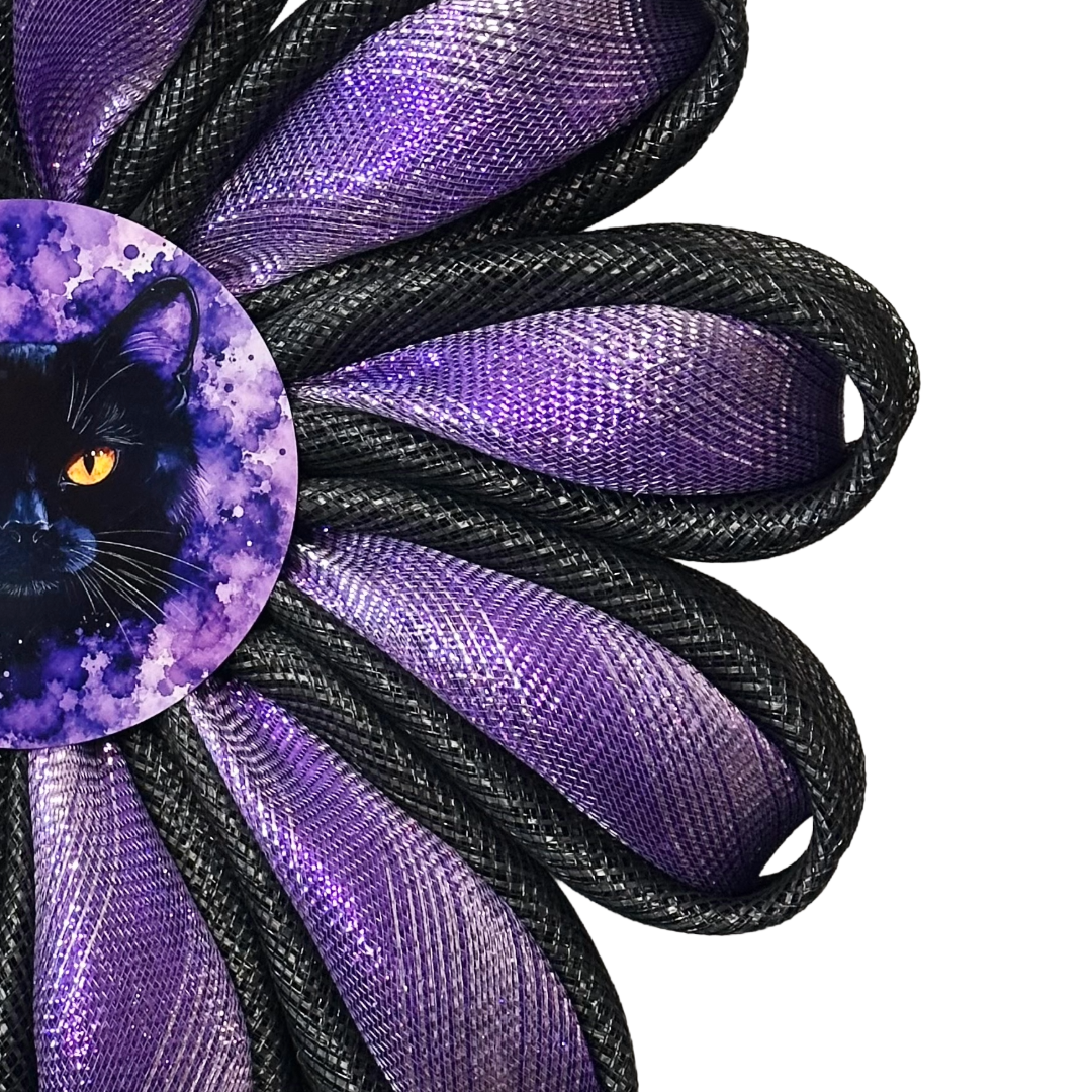Deco mesh daisy chain flower wreath in purple and black with a black cat metal wreath sign by Monkey's Creations. 
