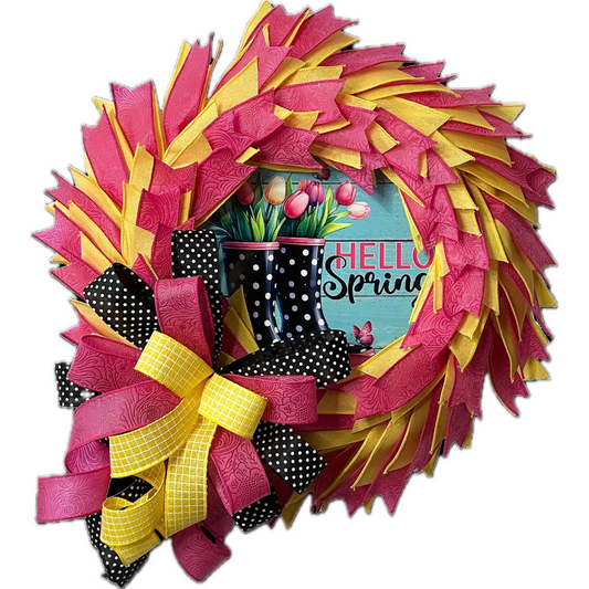 Dollar Tree all ribbon wreath featuring spring themed elements and a large ribbon bow