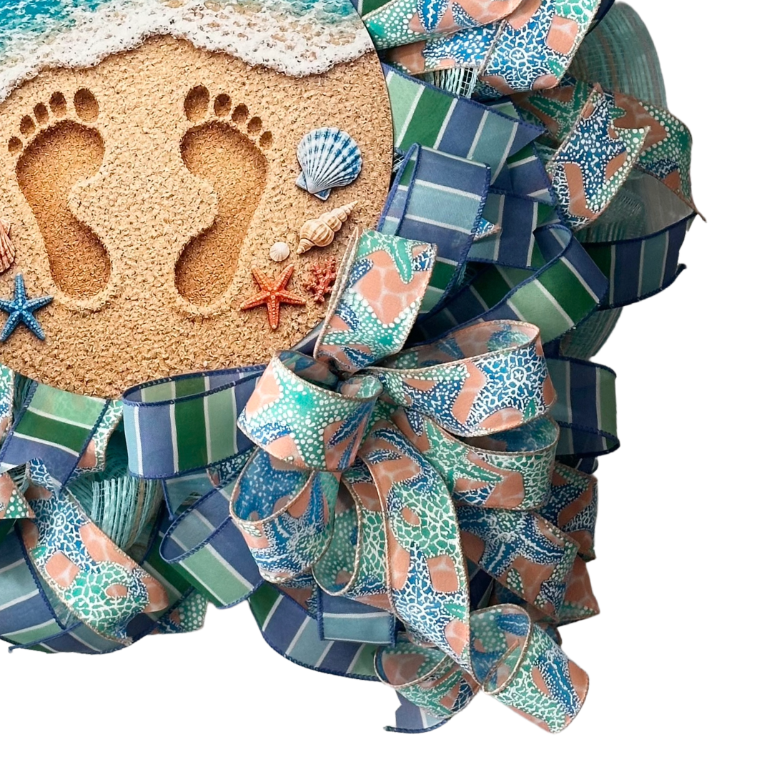 Deco mesh and ribbon wreath featuring coastal beach themed deco mesh and wired ribbon by Monkey's Creations. 