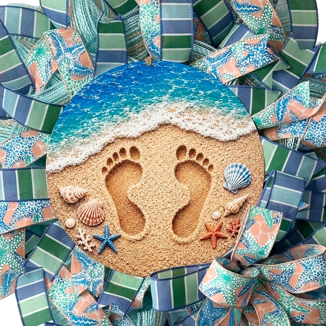 Deco mesh and ribbon wreath featuring coastal beach themed deco mesh and wired ribbon by Monkey's Creations. 