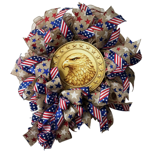 Deco mesh wreath with a golden eagle wreath sign surrounded by American flags themed ribbon 