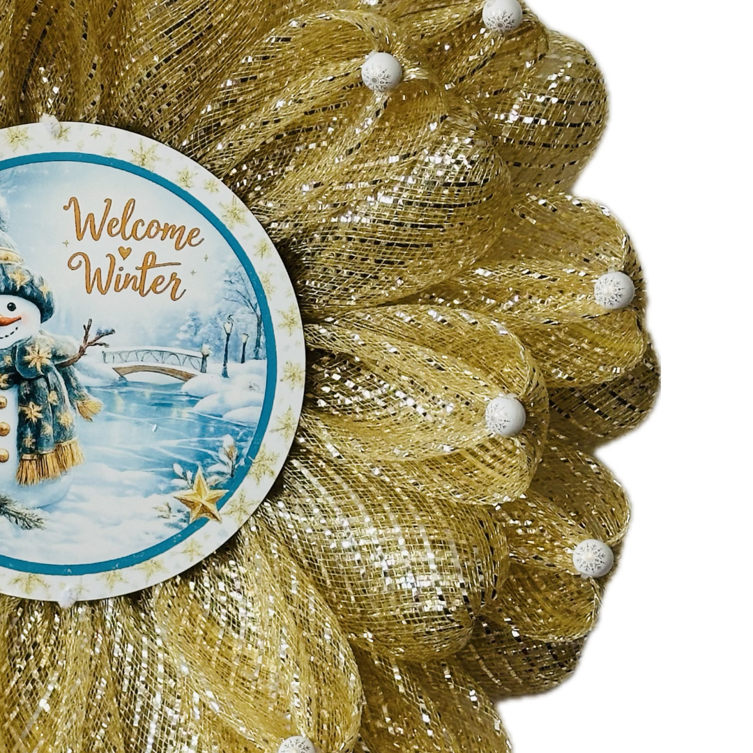 Gold deco mesh 3D flower wreath with beaded flower petals and a gold themed snowman center with "welcome winter" by Monkey's Creations. 