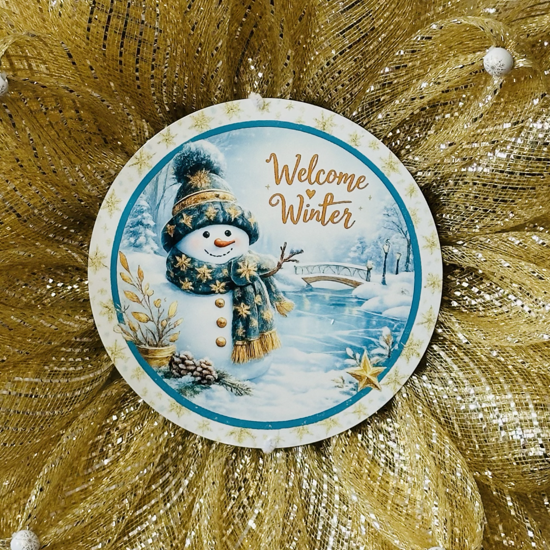 Gold deco mesh 3D flower wreath with beaded flower petals and a gold themed snowman center with "welcome winter" by Monkey's Creations. 