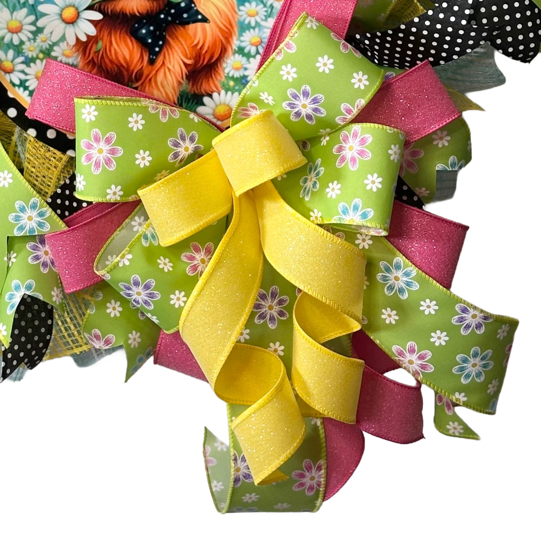 Farmhouse deco mesh and ribbon wreath with a highland cow center by Monkey's Creations. 