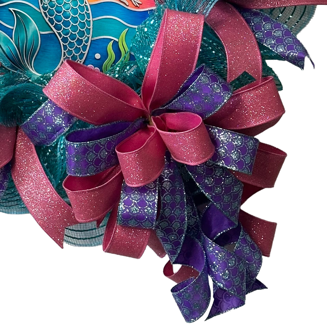 Deco mesh and ribbon wreath with mermaid ocean sunset center by Monkey's Creations.
