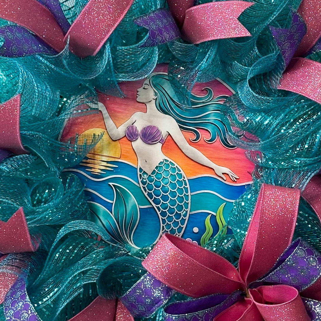 Deco mesh and ribbon wreath with mermaid ocean sunset center by Monkey's Creations.