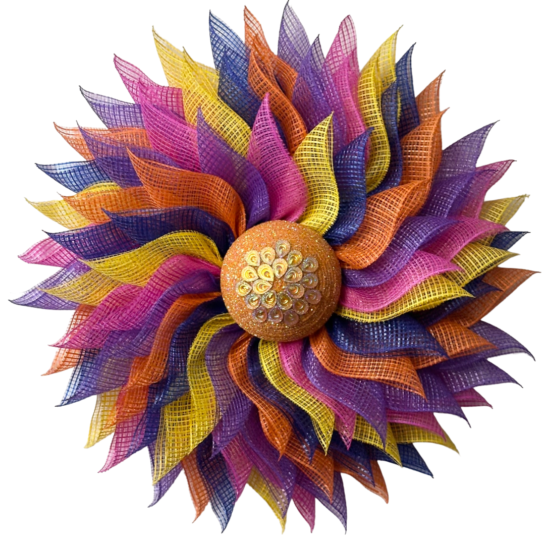 Deco mesh flower wreath with multicolored petals and an orange gemstone flower center 