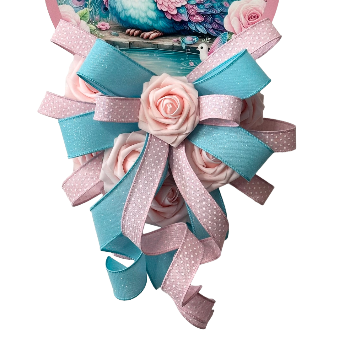 Pastel peacock door hanger with a pink and teal ribbon bow by Monkey's Creations