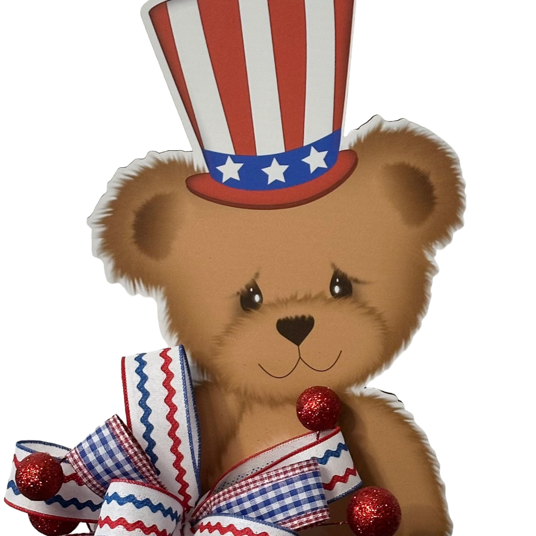 Patriotic bear door hanger with a red white and blue themed ribbon bow by Monkey's Creations