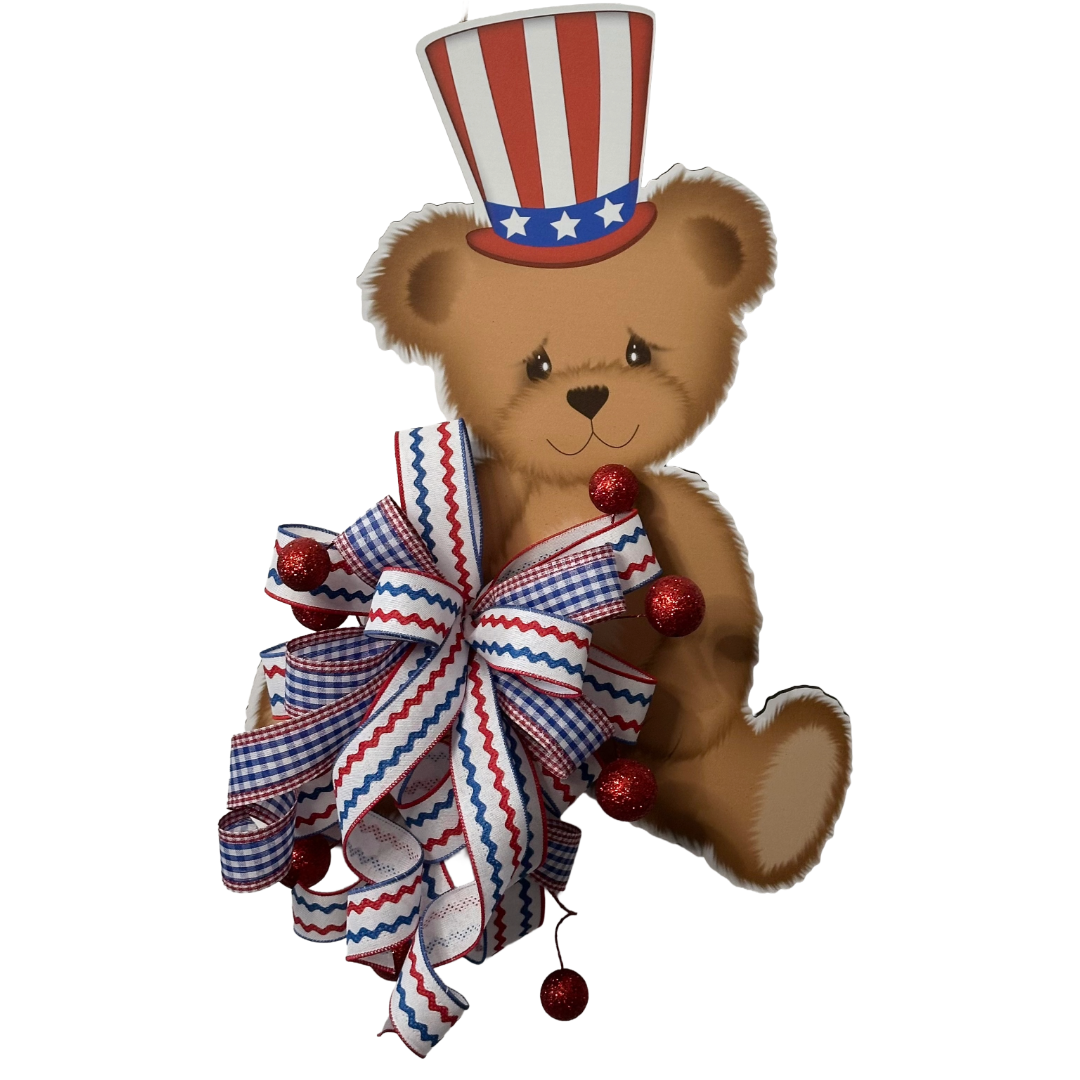 Patriotic bear door hanger with a red white and blue themed ribbon bow by Monkey's Creations
