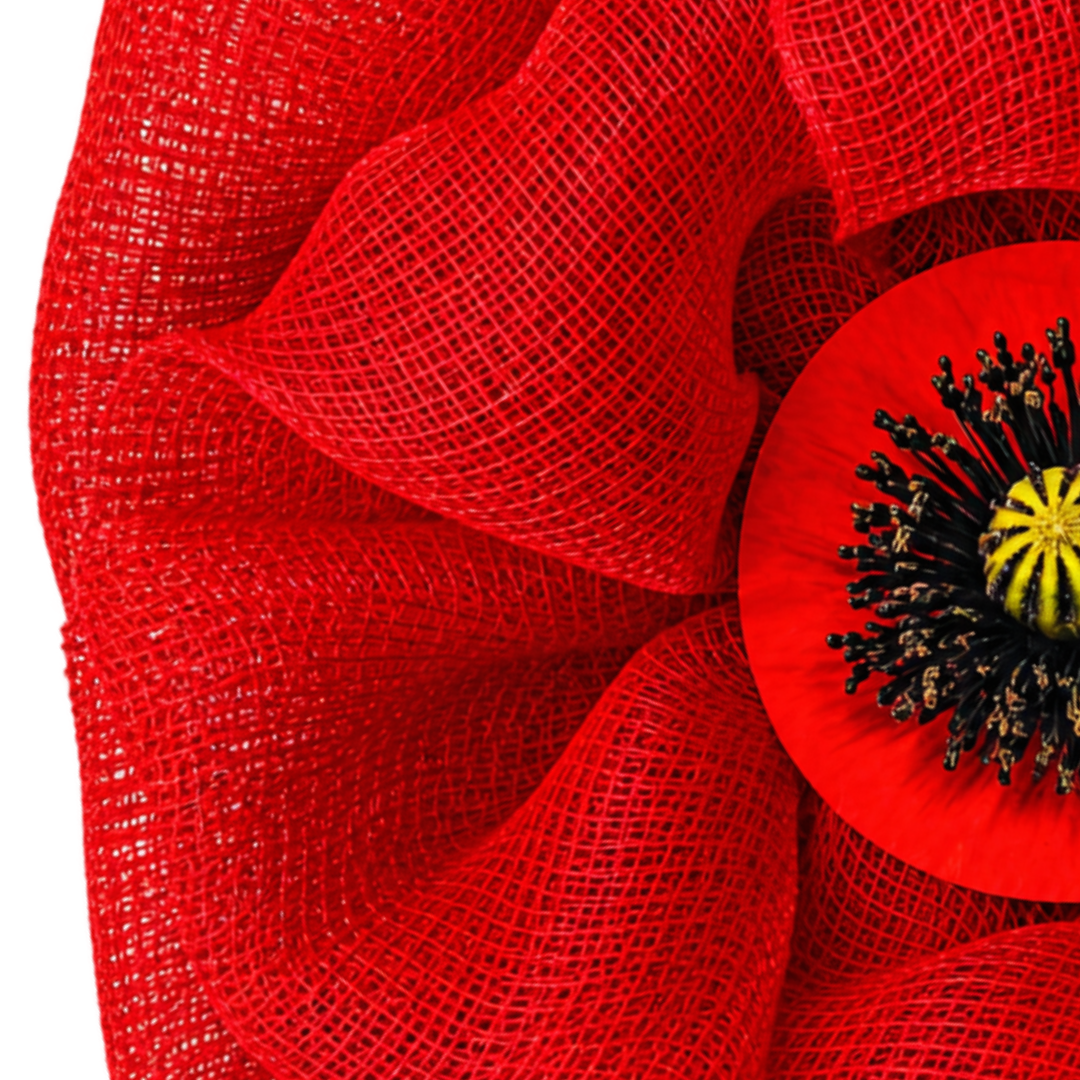Red deco mesh poppy flower with a realistic flower center for Veteran's Day and Remembrance Day by Monkey's Creations. 