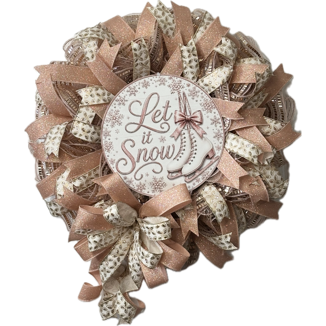 Rose gold deco mesh and ribbon wreath featuring ice skates and "let is snow" by Monkey's Creations. 