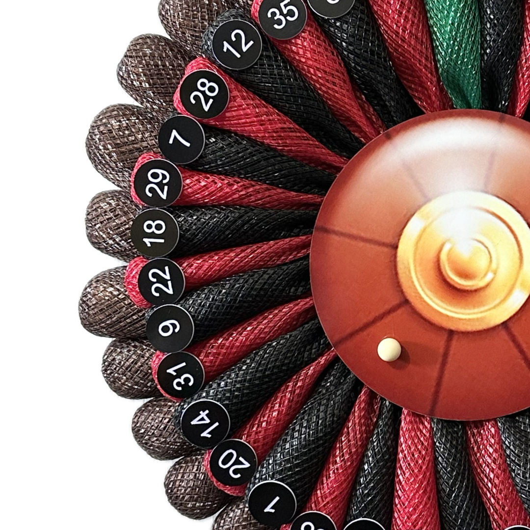 Wreath depicting a roulette wheel with numbers and a ball