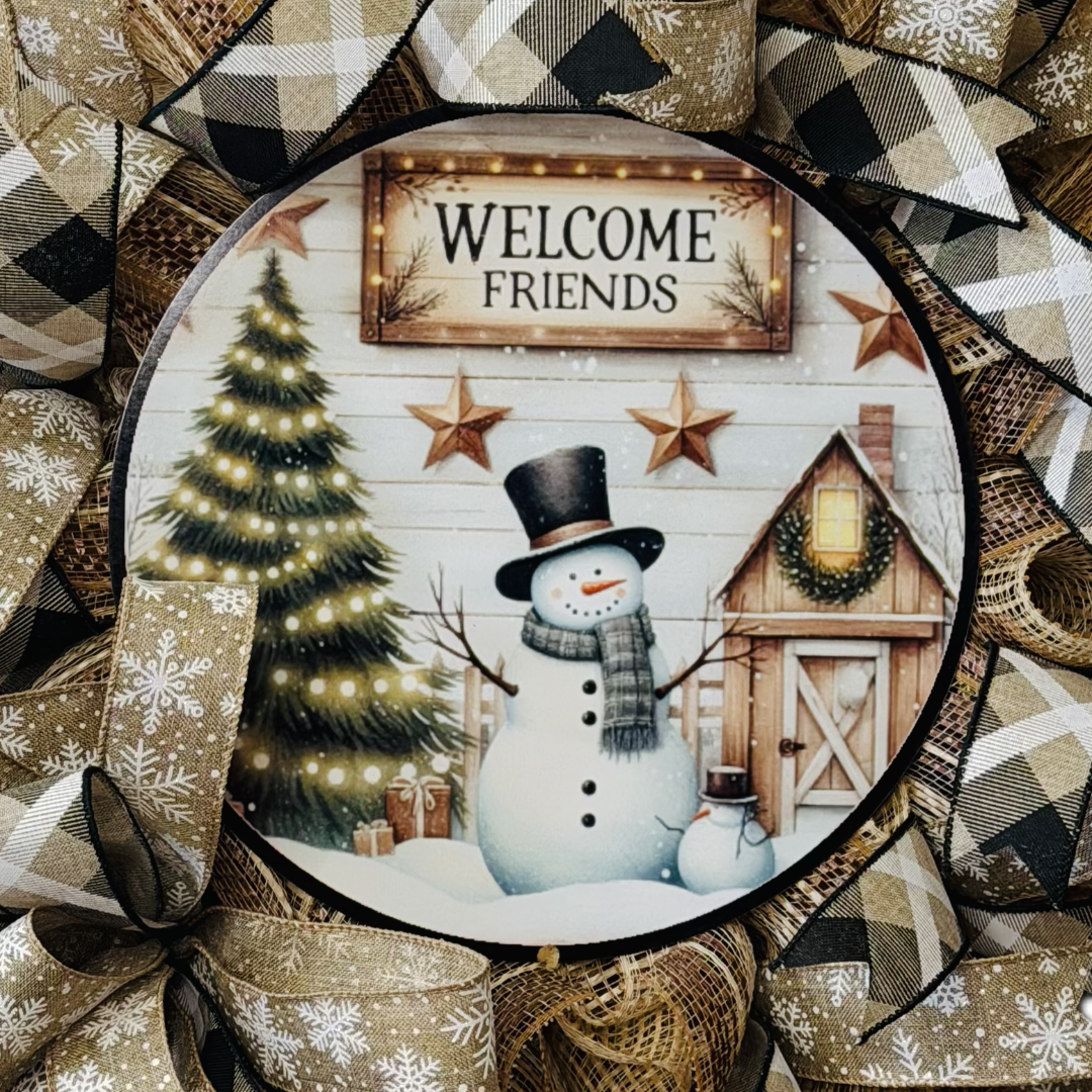 Neutral and rustic deco mesh and ribbon "welcome friends" snowman wreath by Monkey's Creations. 