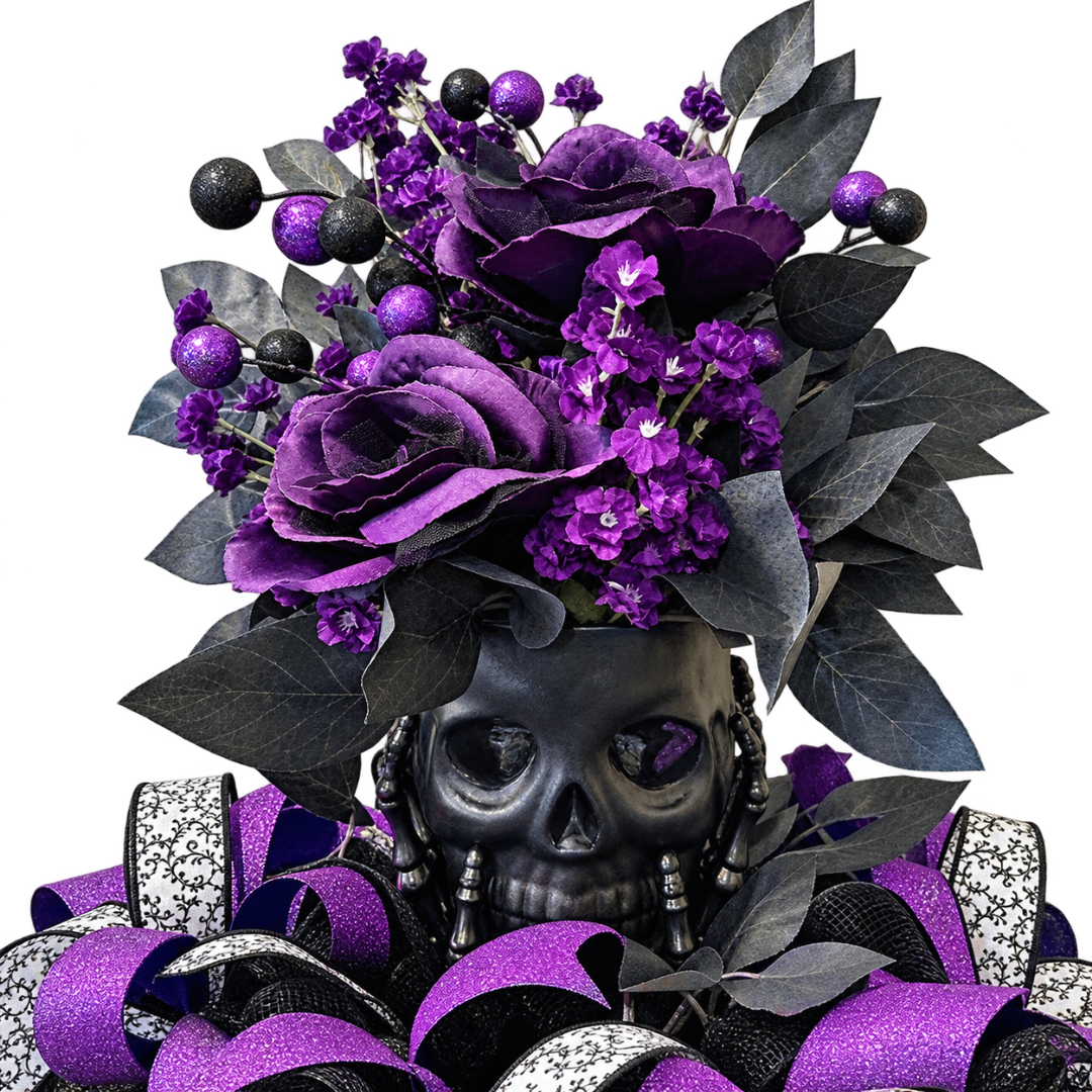 Black and purple themed Halloween skull centerpiece featuring floral picks, purple, black and white ribbon and black focus picks by Monkey's Creations. 