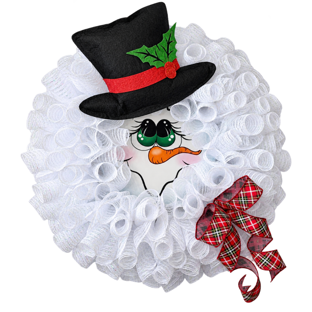 Deco mesh snowman character wreath by Monkey's Creations featuring white deco mesh, a felt top hat accented with holly berries and leaves and a argyle plaid bow. 