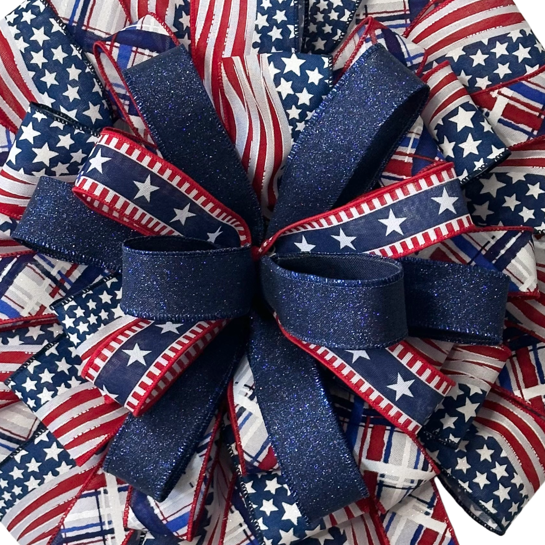 Patriotic ribbon wreath featuring traditional red white and blue and stars and stripes by Monkey's Creations