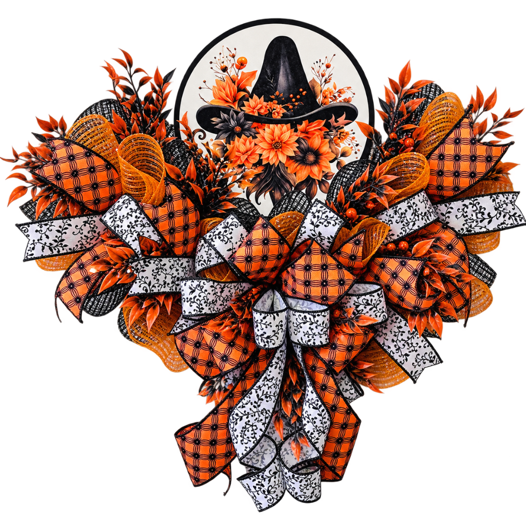 An orange and black Halloween inspired witch hat swag wreath made with deco mesh, ribbon and a round metal wreath sign featuring a witch hat with autumn flowers and foliage by Monkey's Creations.