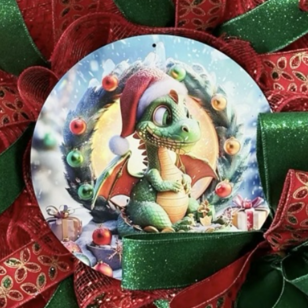 red deco mesh with green and red ribbon baby dragon christmas wreath, focus on the wreath sign