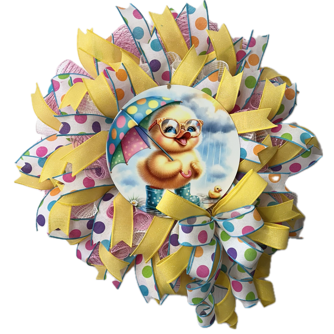 Easter wreath with colorful ribbon, deco mesh and a duckling  background