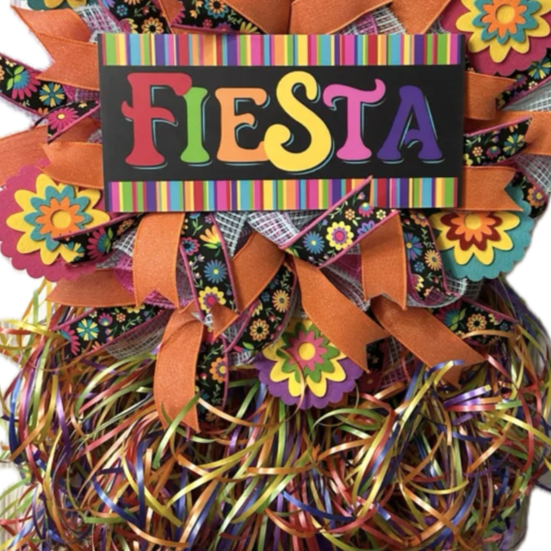 multicolor orange dominant fiesta wreath with ribbon, striped multicolor sign and ribbon strings, focus on the wreath sign