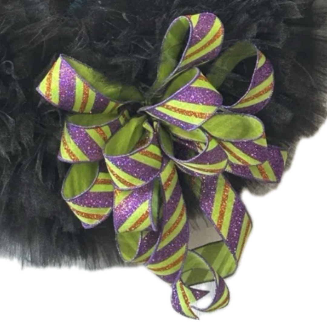 Halloween black cat face wreath with green, purple and orange bow, focus on the bow
