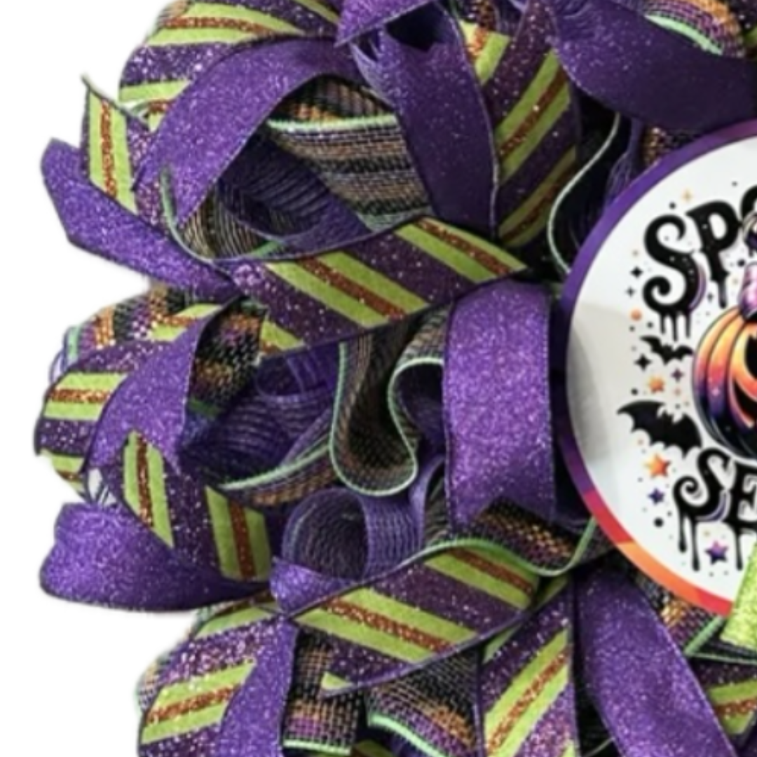 purple , green and orange halloween spooky season pumpkin wreath with ribbon and deco mesh, focus on ribbon and deco mesh