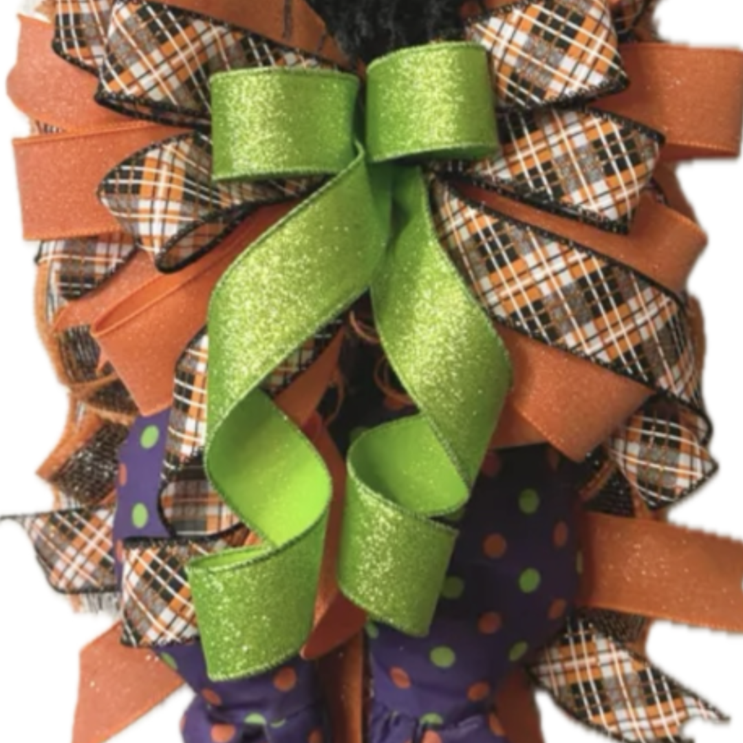 black and orange halloween witch swag wreath, focus on ribbon