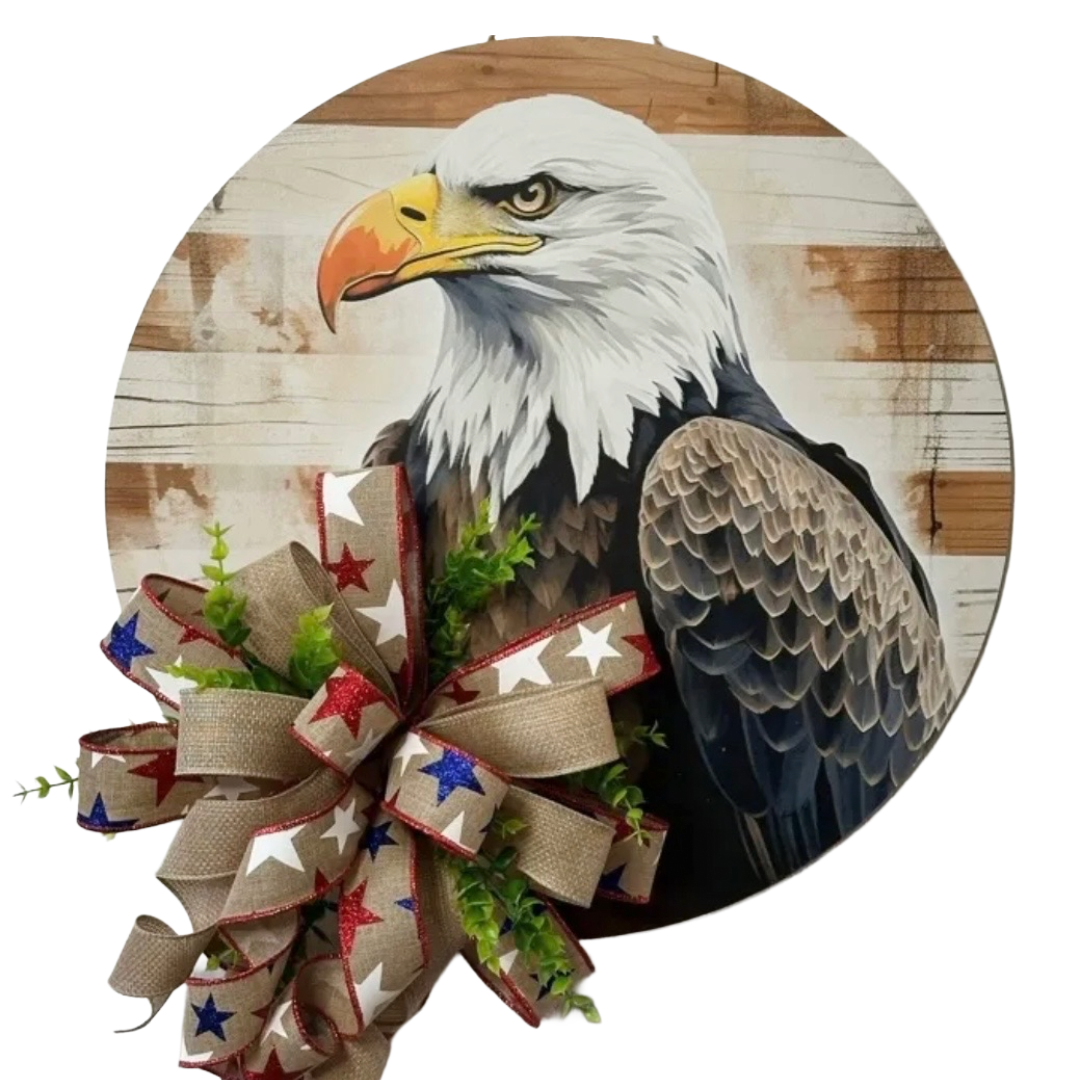 Round bald eagle board wreath with patriotic ribbon and foliage