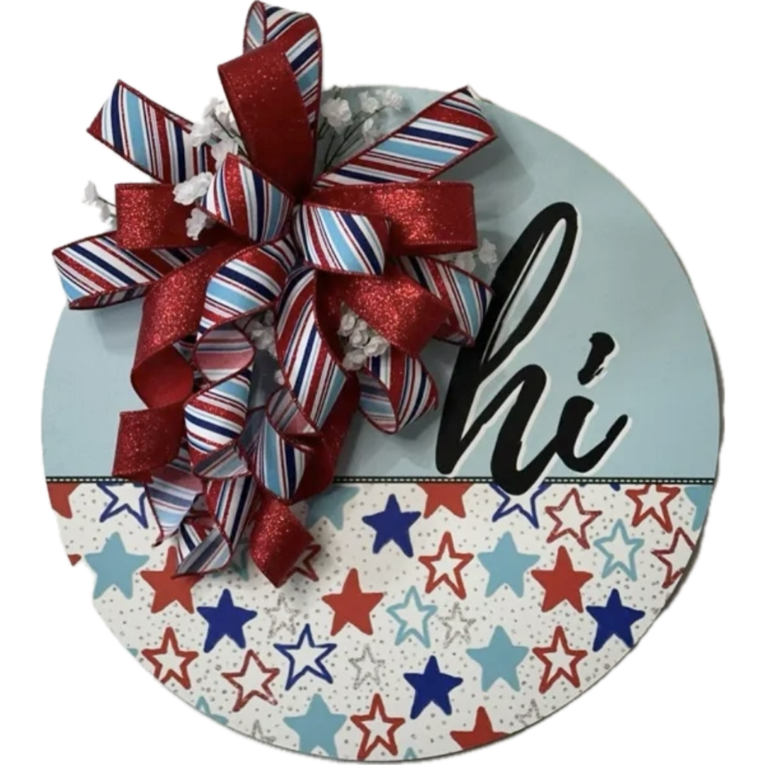 Patriotic round hi wreath with red white and blue stars, flowers and ribbon