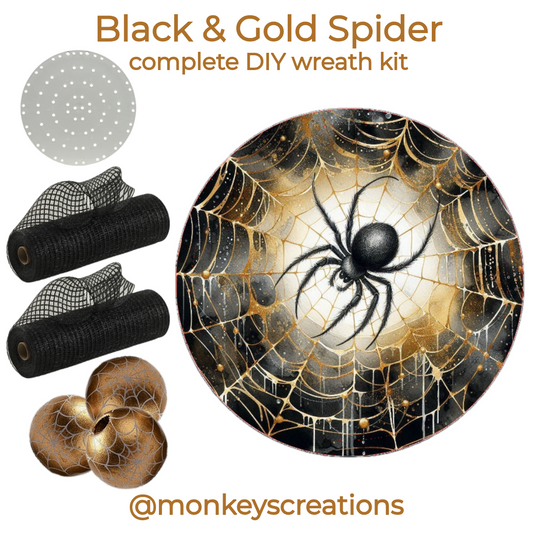 Black and gold spider complete DIY wreath kit by Monkey's Creations. Kit includes an 8" black spider on a gold web metal wreath sign by Monkey's Creations, 2 10" x 30 yard rolls of black breeze deco mesh, 40 16mm wooden gold beads with white spider webs, 100 pack of zip ties and a uitc small board.