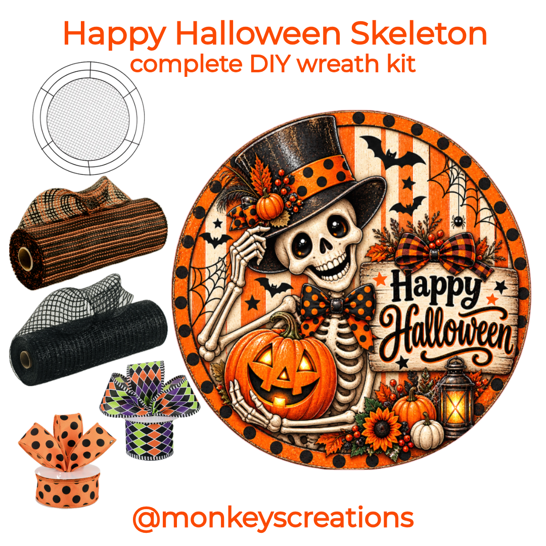 Happy Halloween skeleton DIY wreath kit with a 10" round metal wreath sign featuring a smiling skeleton, jack-o'-lantern, bats, spiderwebs, pumpkins, and 'Happy Halloween' with 2 rolls of wired color coordinated ribbon, two rolls of deco mesh and a 14" Wreaths of Joy wire mesh work form by Monkey's Creations. 