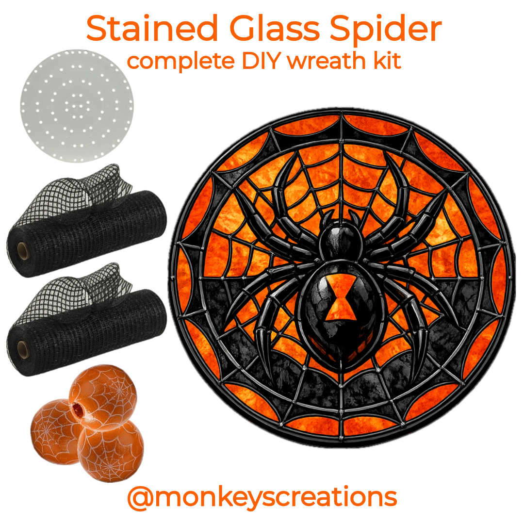 Stained glass spider complete DIY wreath kit by Monkey's Creations. Kit includes an 8" orange and black stained glass spider metal wreath sign by Monkey's Creations, 2 10" x 30 yard rolls of black breeze deco mesh, 40 16mm wooden orange beads with white spider webs, 100 pack of zip ties and a uitc small board.
