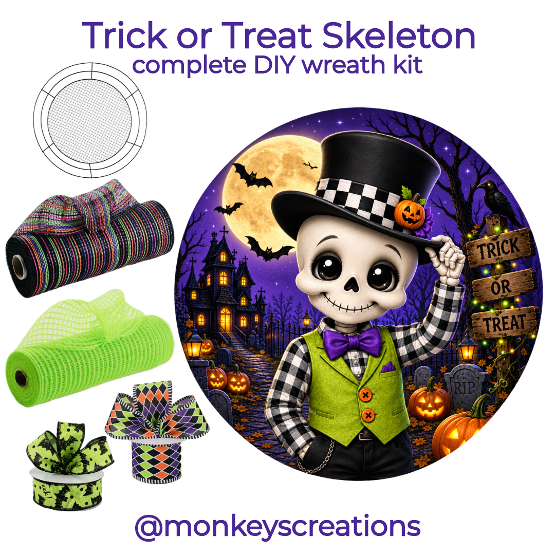 Trick or Treat Skeleton DIY wreath kit featuring a 10" round metal wreath sign with a dapper skeleton and "trick or treat" alongside 2 rolls of color coordinated wired ribbon, 2 rolls of deco mesh and a 14" Wreaths of Joy wire mesh work form by Monkey's Creations.  