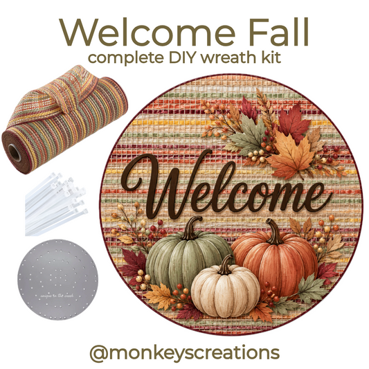 Complete DIY wreath kit featuring a roll of striped autumn colored deco mesh, zip ties, a small board and a round metal welcome Autumn themed wreath sign by Monkey's Creations. 