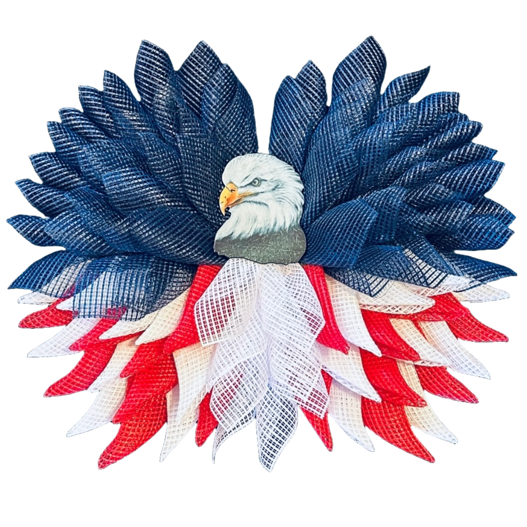 monkey's Creations signature eagle wreath with blue, white, and red decor mesh petals and an eagle face in the centre by Iveth Wright
