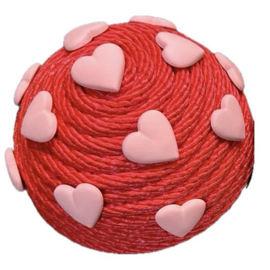 red round flower center with pink hearts