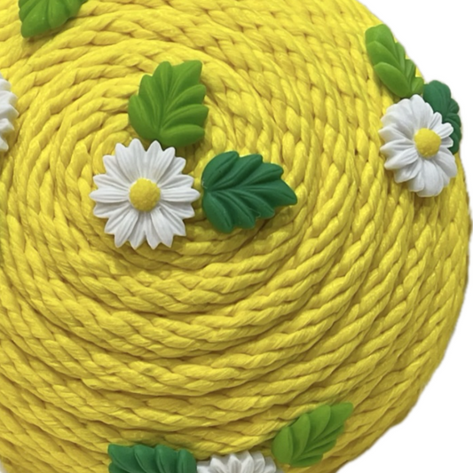yellow rope round flower center with white daisies 